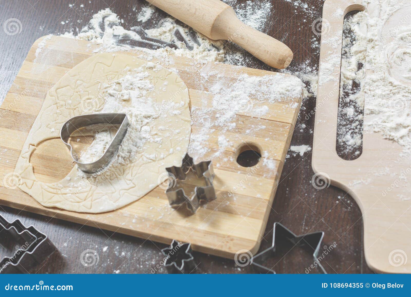 process-making-homemade-cookies-wooden-board-flour-dough-cookie-cutters-shape-heart-star-lie-table-o-108694355.jpg